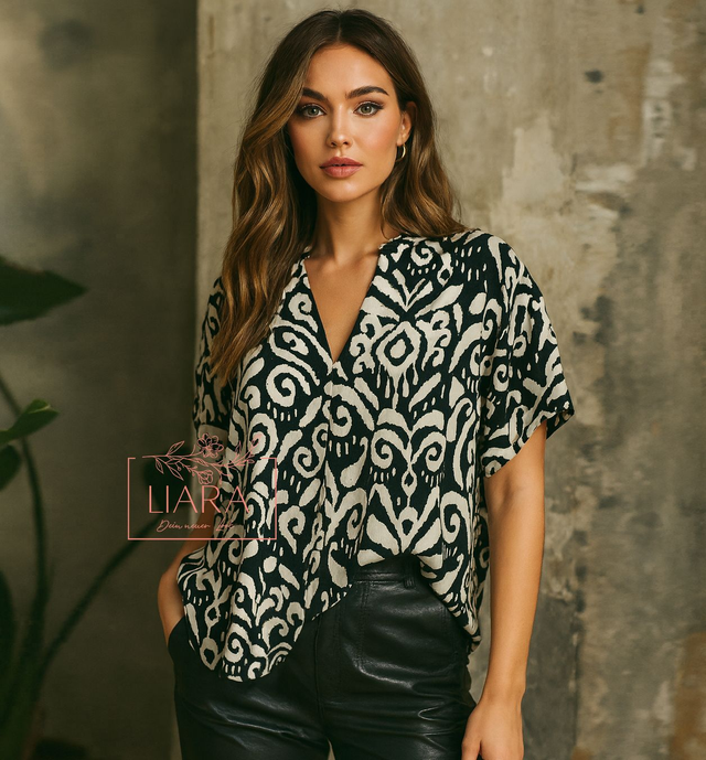 Schnörkel Bluse in creme schwarz Gr M