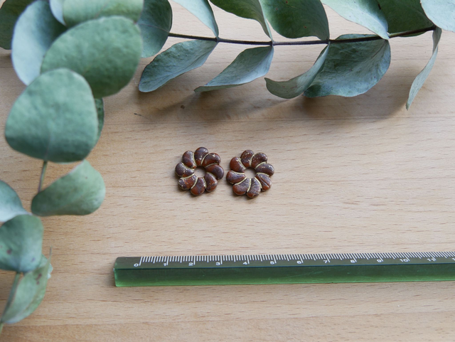 Marguerite tournante chocolat/doré