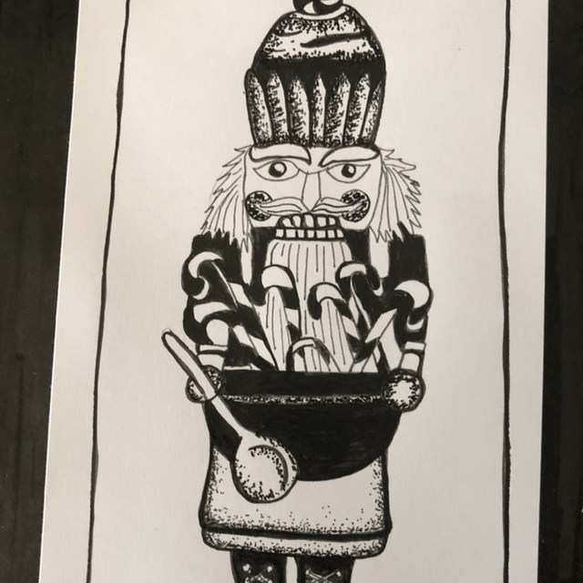 Fête - casse noisette en cuisine - 14 x 20 cm - encadrement noir 