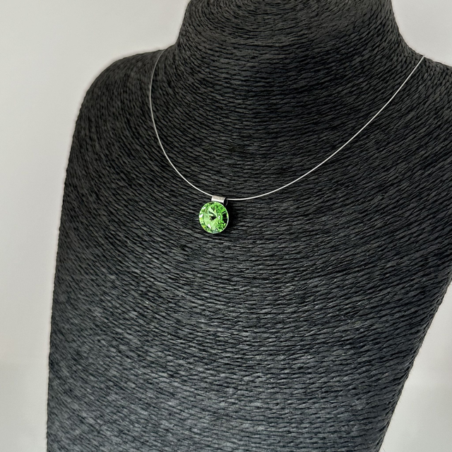 Solitär RIVOLI 12 an Edelstahlreifen, Peridot Grün