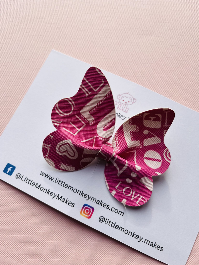 Pink butterfly bow