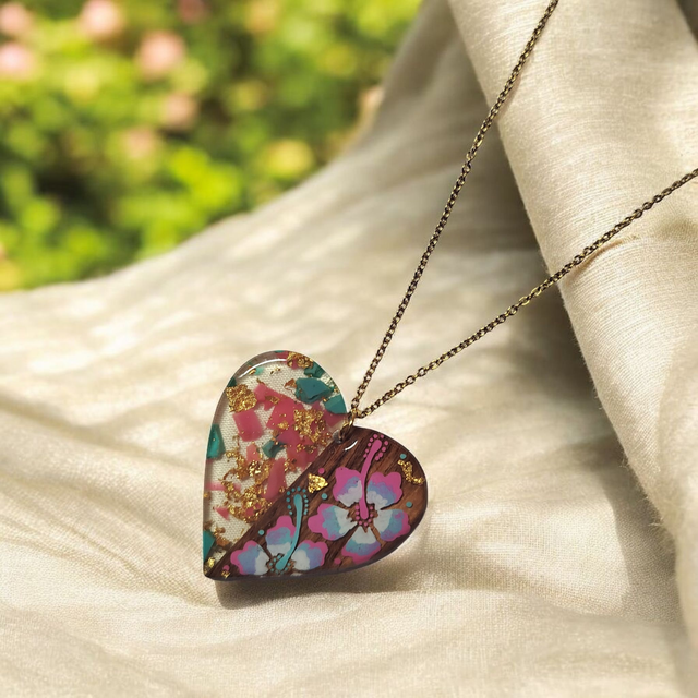 Collier dessiné Flora acier inoxydable rose blanc bleu bi matière