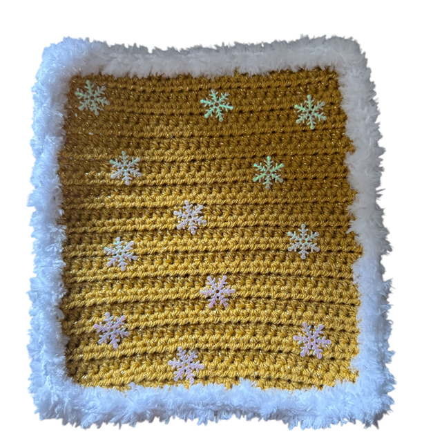 Couverture dorée et flocons 