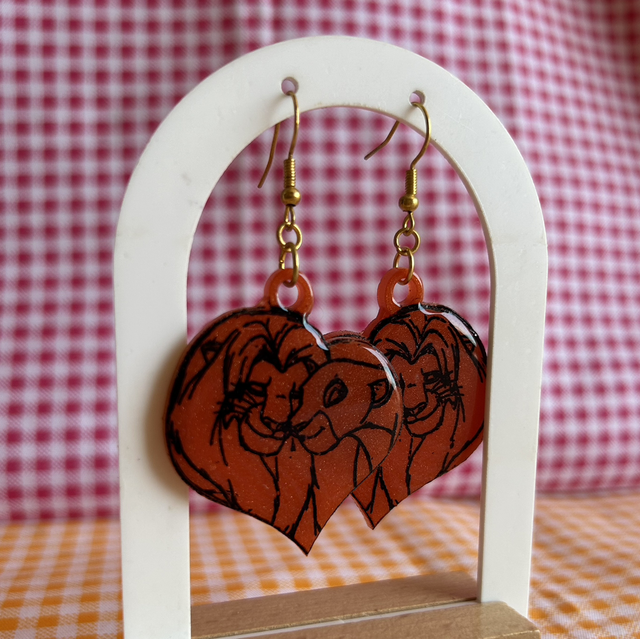 Pendientes Rey León