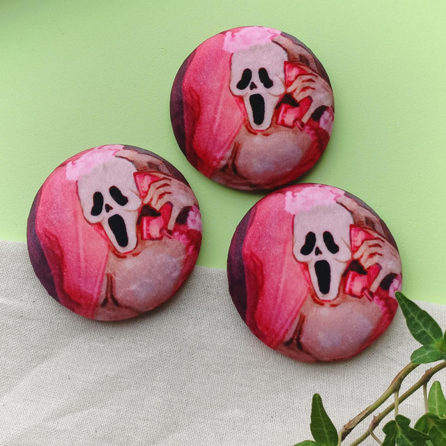 caller - plush pin badge