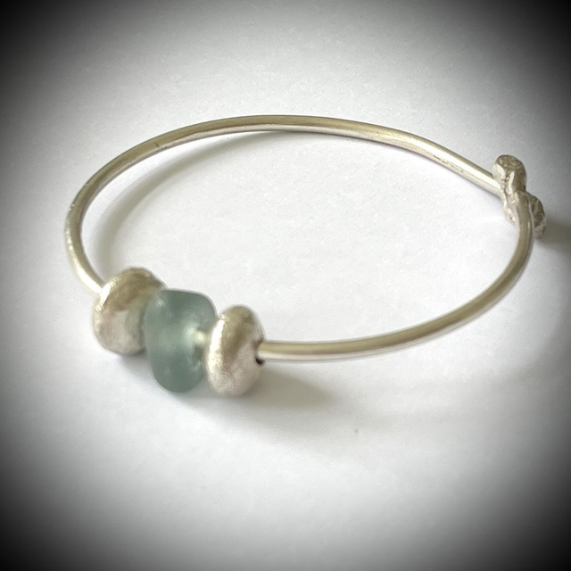 Silver Bangle with silver pebbles and aqua sea glass