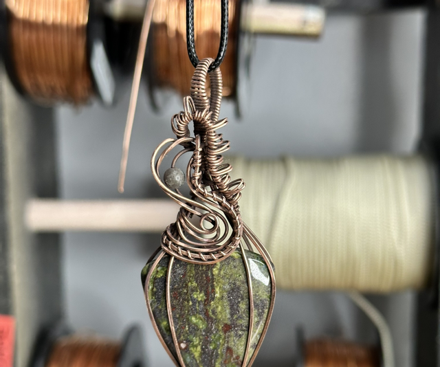 Dragons blood jasper pure copper wrapped pendant 