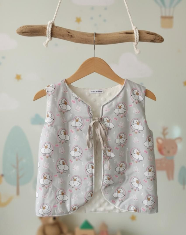 Gilet berger taille 3 ans.