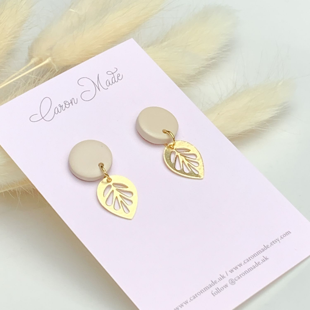 Small beige neutral stud and brass leaf earrings