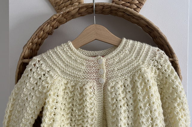 Yellow hand knitted bolero 