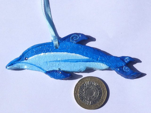 Wonderful "Animal Inspirations" Hanging Gift. "Striped Dolphin". With an inspirational motto on the reverse.