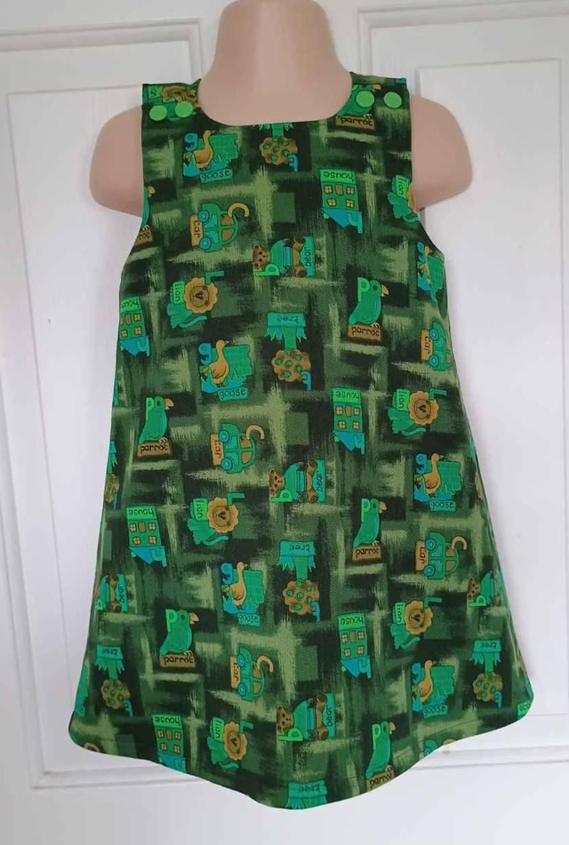 Dress - 18 mth (86 cm).   Dark green with letters