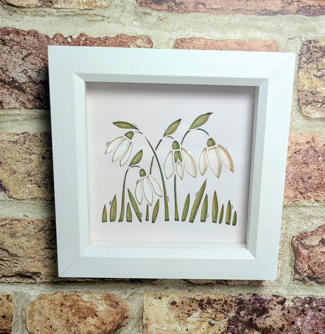 'Snowdrops' Paper Cut Art Print with Hand Decorated Details, in White Hanging Frame, By Wallsy