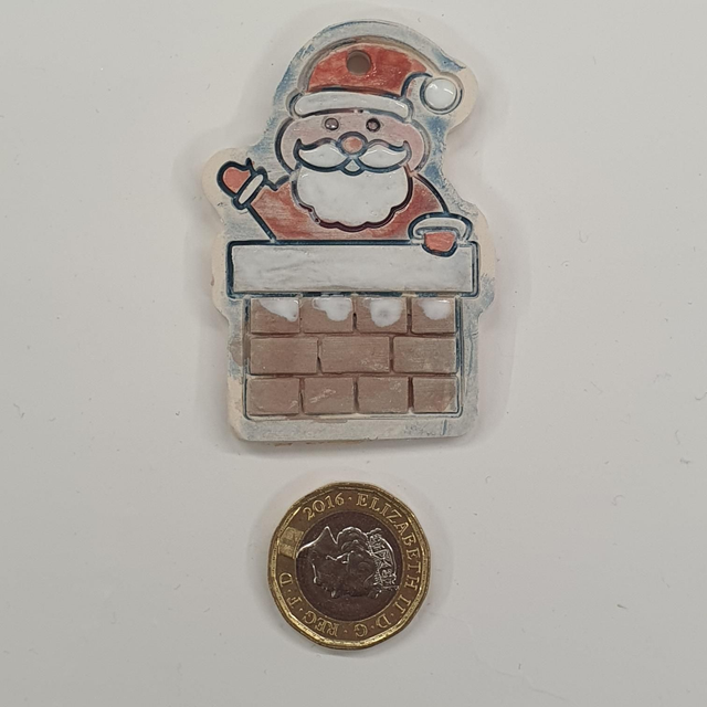 Santa in chimney hanging decoration 