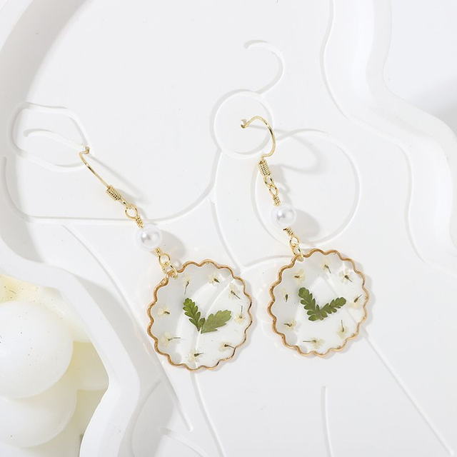 Boucle d&#039;oreille pendant fleur