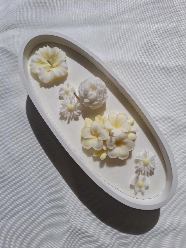 Blütenzauber Kerze im Betonefäß