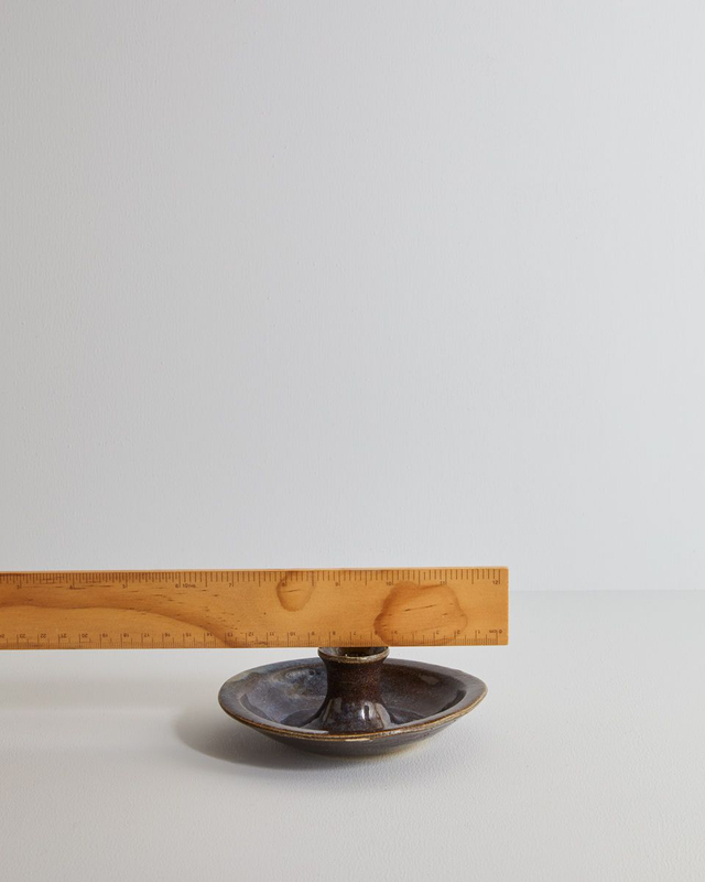 Candle stick holder in blue mist