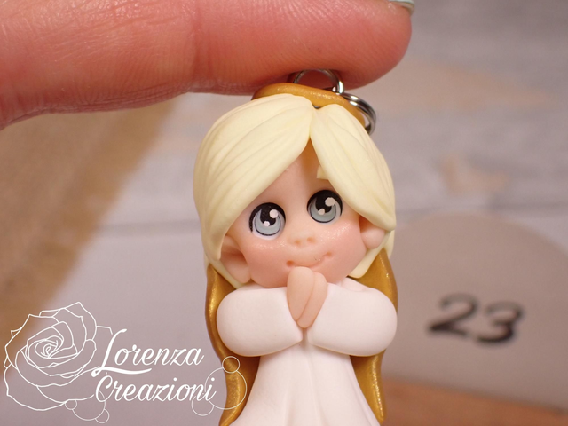 Angioletto custode tascabile n. 23
Portachiavi o charm, artigianale, pezzo unico. Modellato a mano argilla polimerica, made in Italy.
