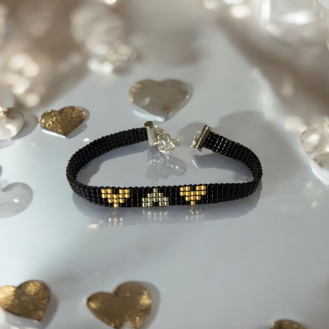 Bracelet fin noir coeurs or et argent