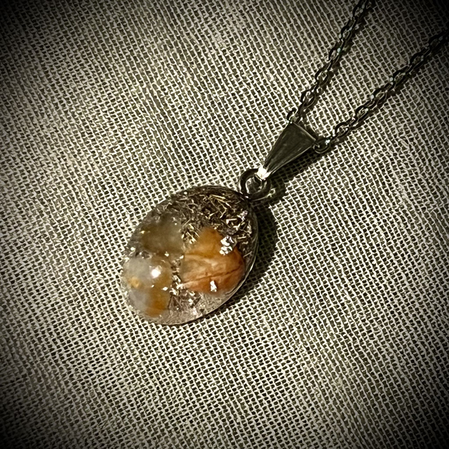 Crystal Energy Oval Pendant with Carnelian/metal shavings (small)