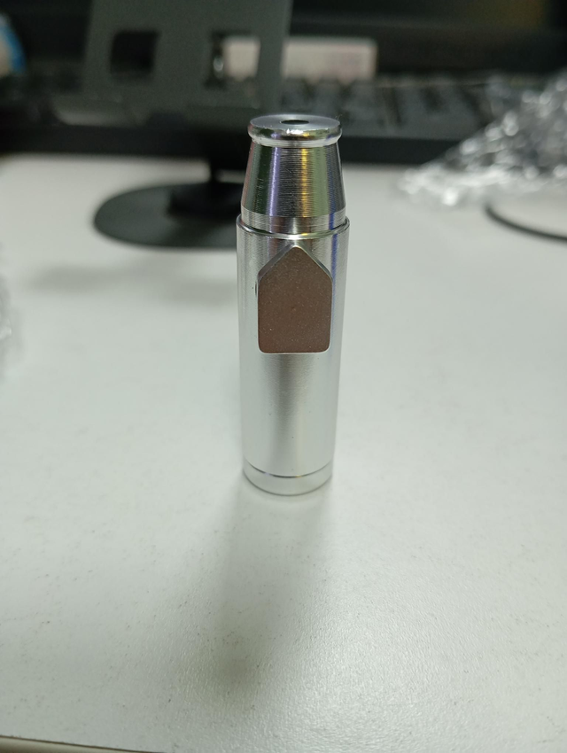 Dosificador plateado