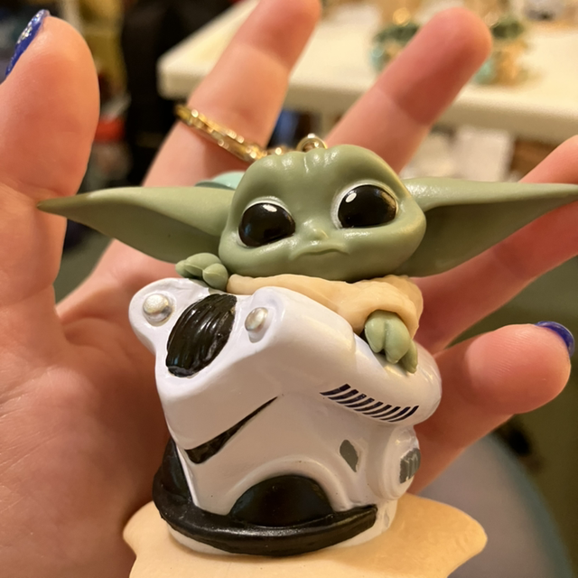 Baby Yoda/Grogu in a Stormtrooper’s helmet 