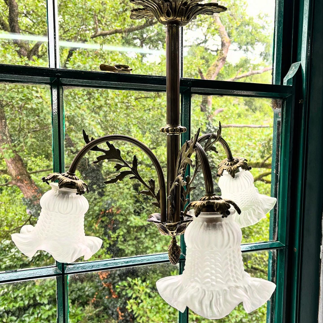 A 19th Century Brass Three Arm Chandelier With French Tulip Glass Shades