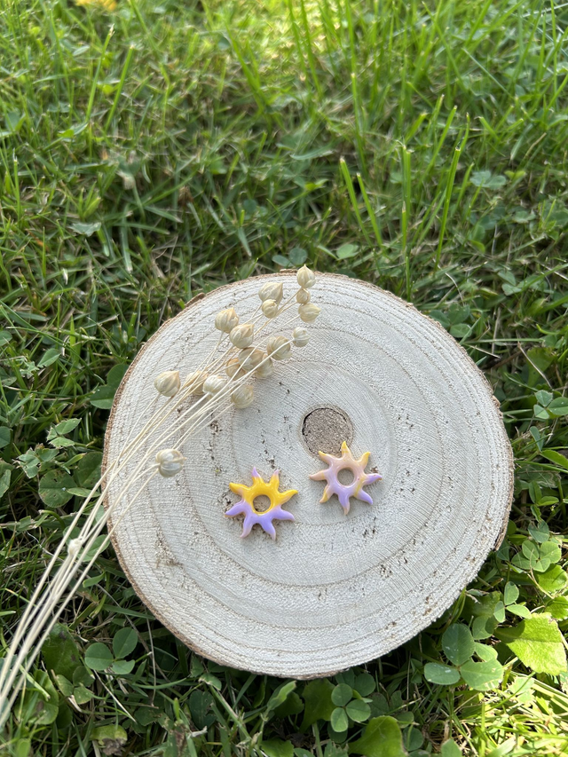 Pampilles Sun mélange de jaune, violet et beige. 