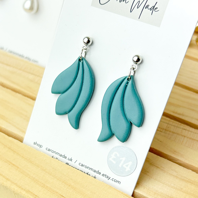 Blue and gold floral shape earrings