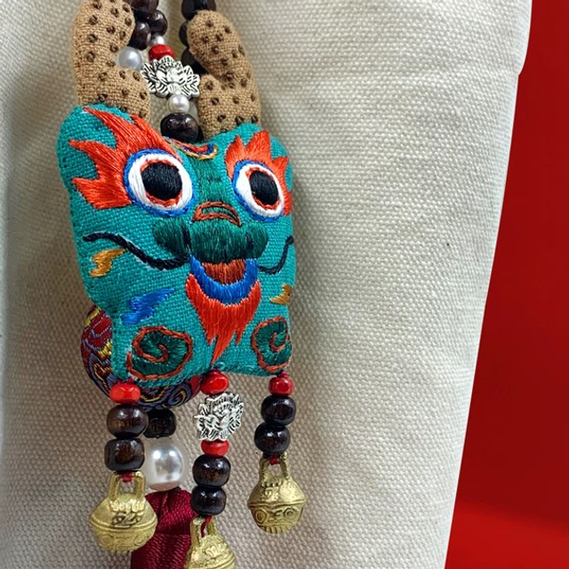 Amulette des Douze Signes – aux herbes