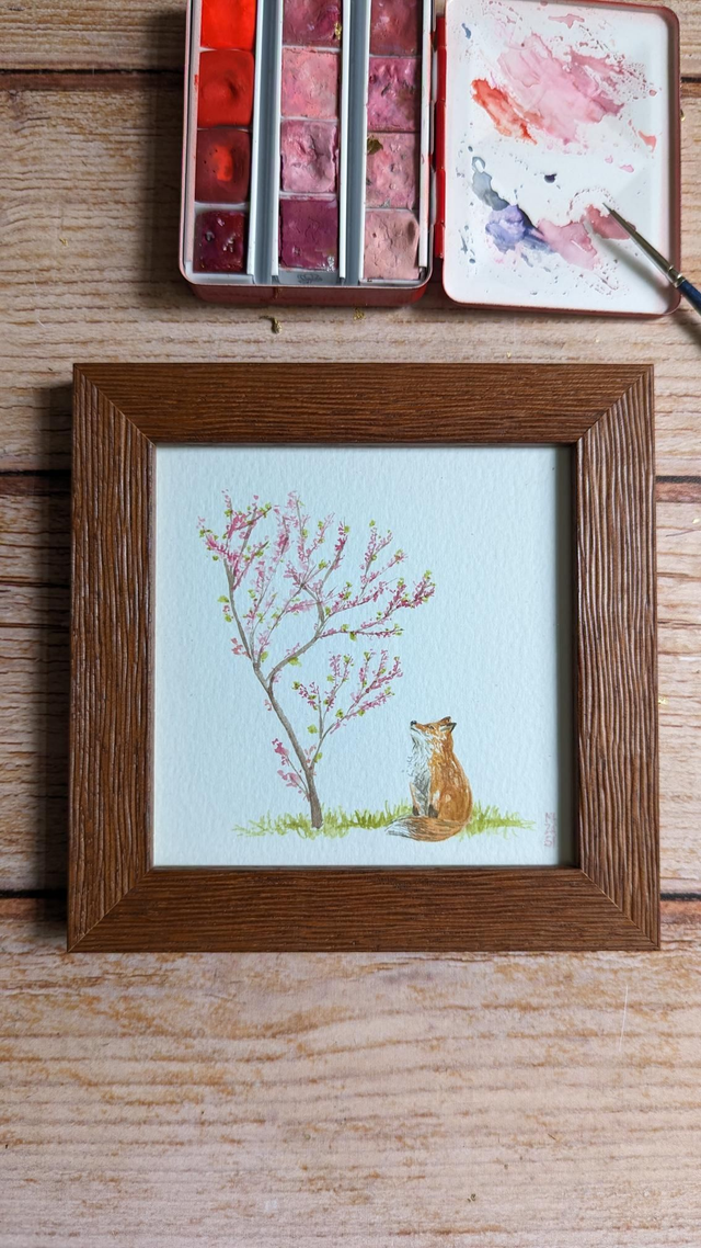 Petit renard et arbre de printemps