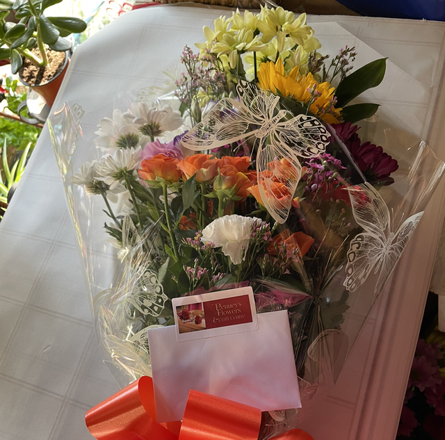 Wrap of mixed fresh flowers 