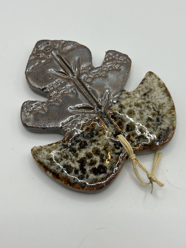 Feuille décorative ronde en grès