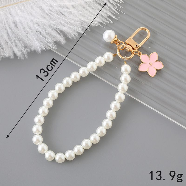 Porte-clés ou pendentif de sac fleur rose