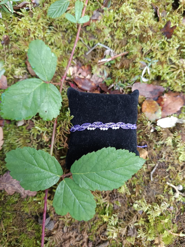 Bracelet effet dentelle avec perle argenté 