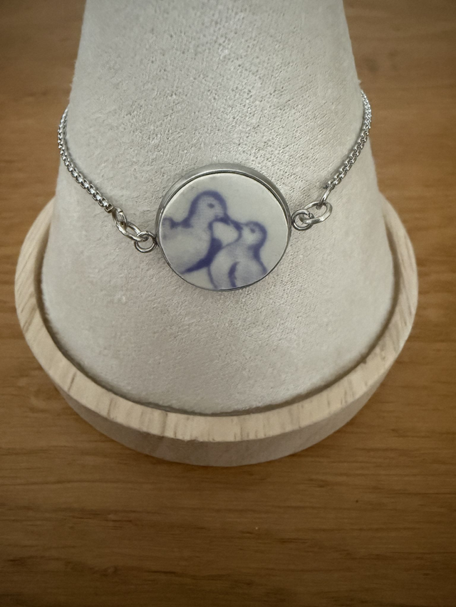 Bracelet coulissant argenté aux oiseaux