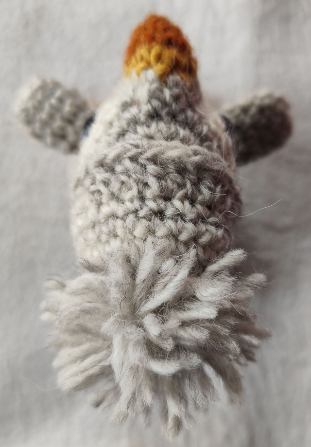 Shiny the white puffin with grey and white hat, medium size (made from Icelandic wool yarn)