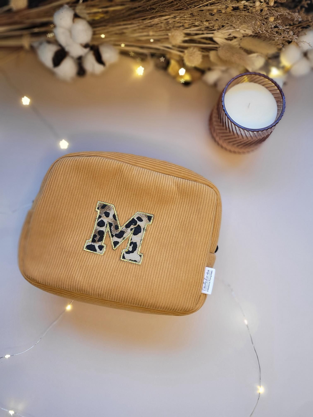 Trousse de toilette appliqué léopard 