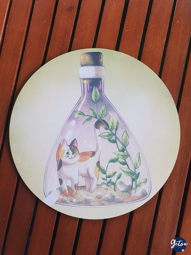 Tapis de souris chat dans une fiole triangle