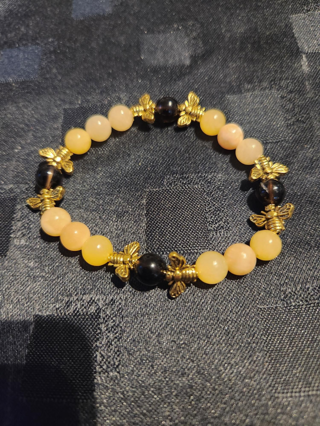 Honey calcite and smokey quartz with bumblebees 