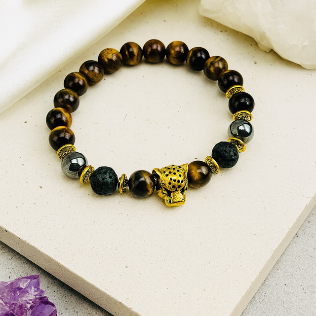 Golden Instinct – Armband met Tijgeroog &amp; Luipaardkop