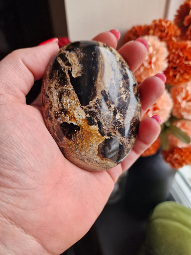 Black opal palm stone 