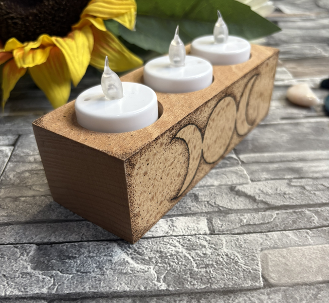 Triple moon tealight holder