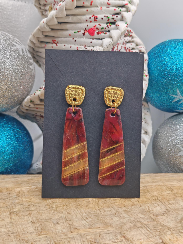 Boucles uniques marbrées Rouge Noir 