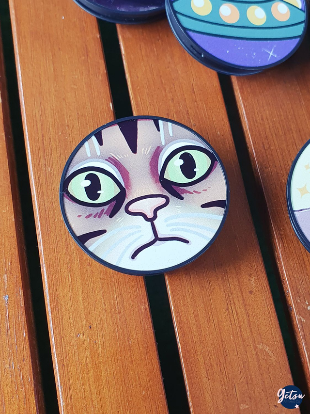 Poignée de téléphone chat aux gros yeux