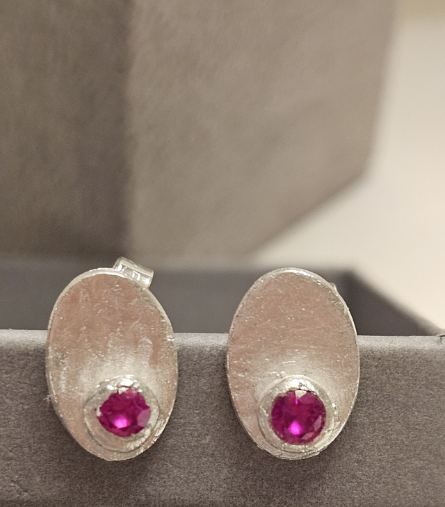 Oval fuschia cubic zirconia silver studs