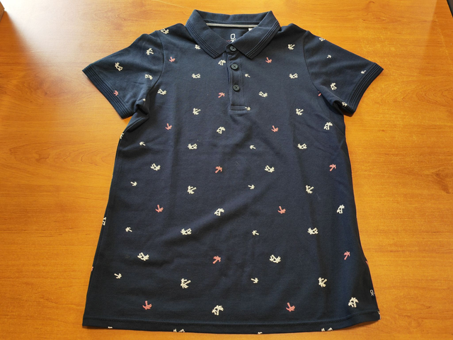 Polo bleu foncé en 12 ans