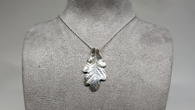 Oak leaf pendant on silver necklace 