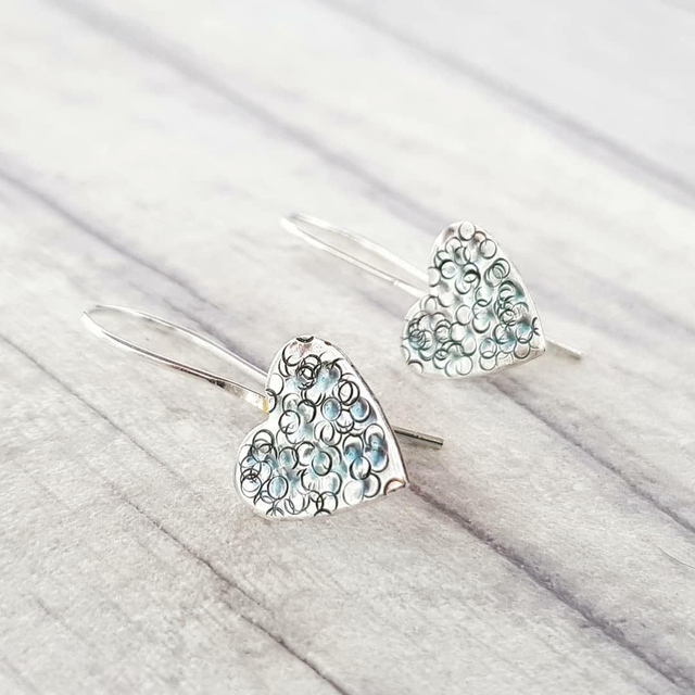 Long drop textured heart earrings