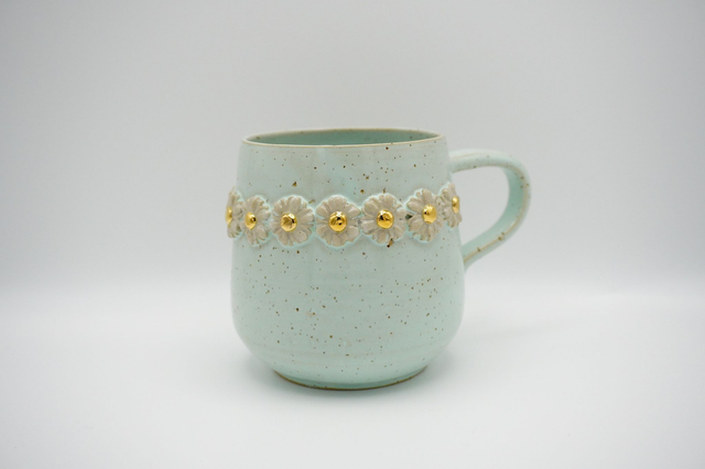 Daisy i mint med guld